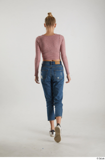 Kate Jones  1 back view blue jeans casual dressed…